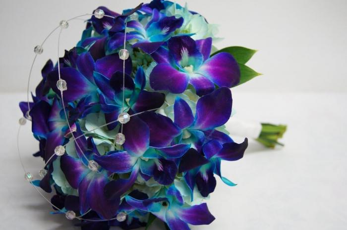 Hochzeitsblumenstrauß von Orchideen - die perfekte Ergänzung des Bildes der Braut