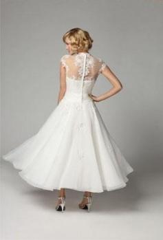 Wählen Sie ein Retro-Hochzeitskleid für Ihren schönsten Tag